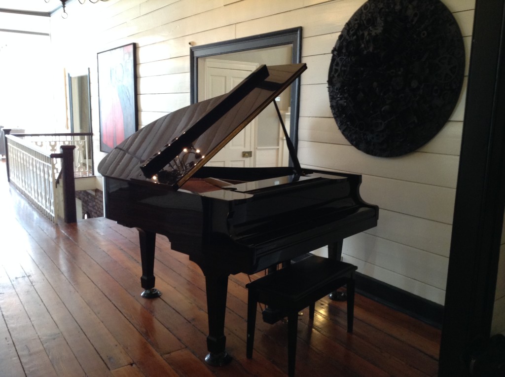 The grand piano beside a window at 3109 Piedmont Estate and Gardens