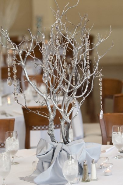Silver tree winter wonderland themed wedding table centerpiece for December wedding