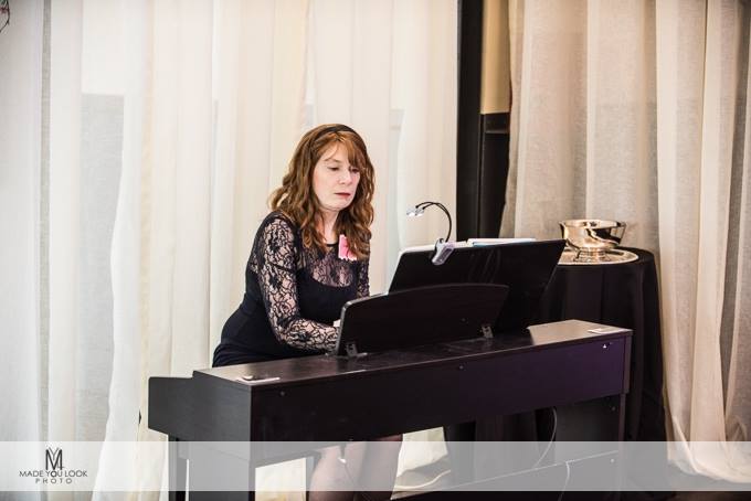 Jenny at her digital piano at the Foundry at Puritan Mill