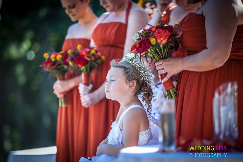 Lake Lanier Islands outdoor Wedding -- Bridesmaids and Flower Girls Praying