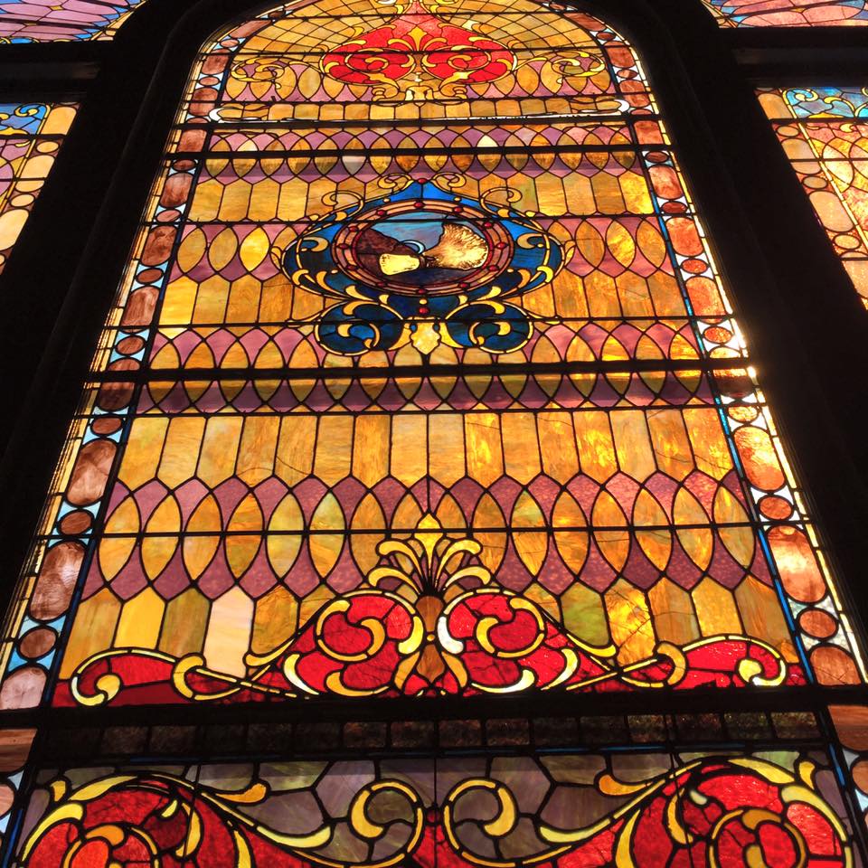 Warmly colored stained glass at Inman Park United Methodist Church in Atlanta