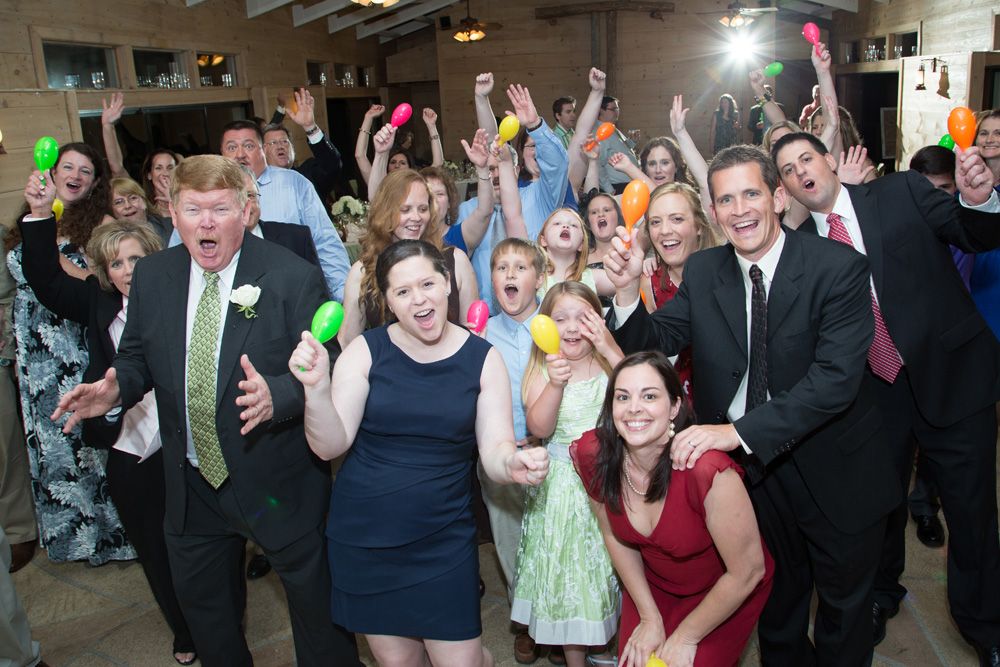 A wedding group celebrating together at a DJ Tod event
