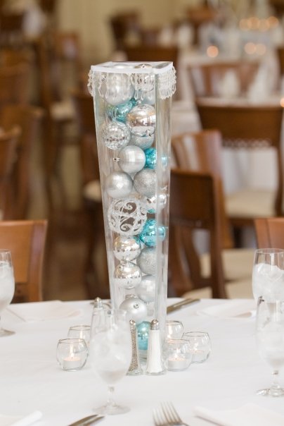 Blue and silver winter wonderland table centerpiece for December wedding