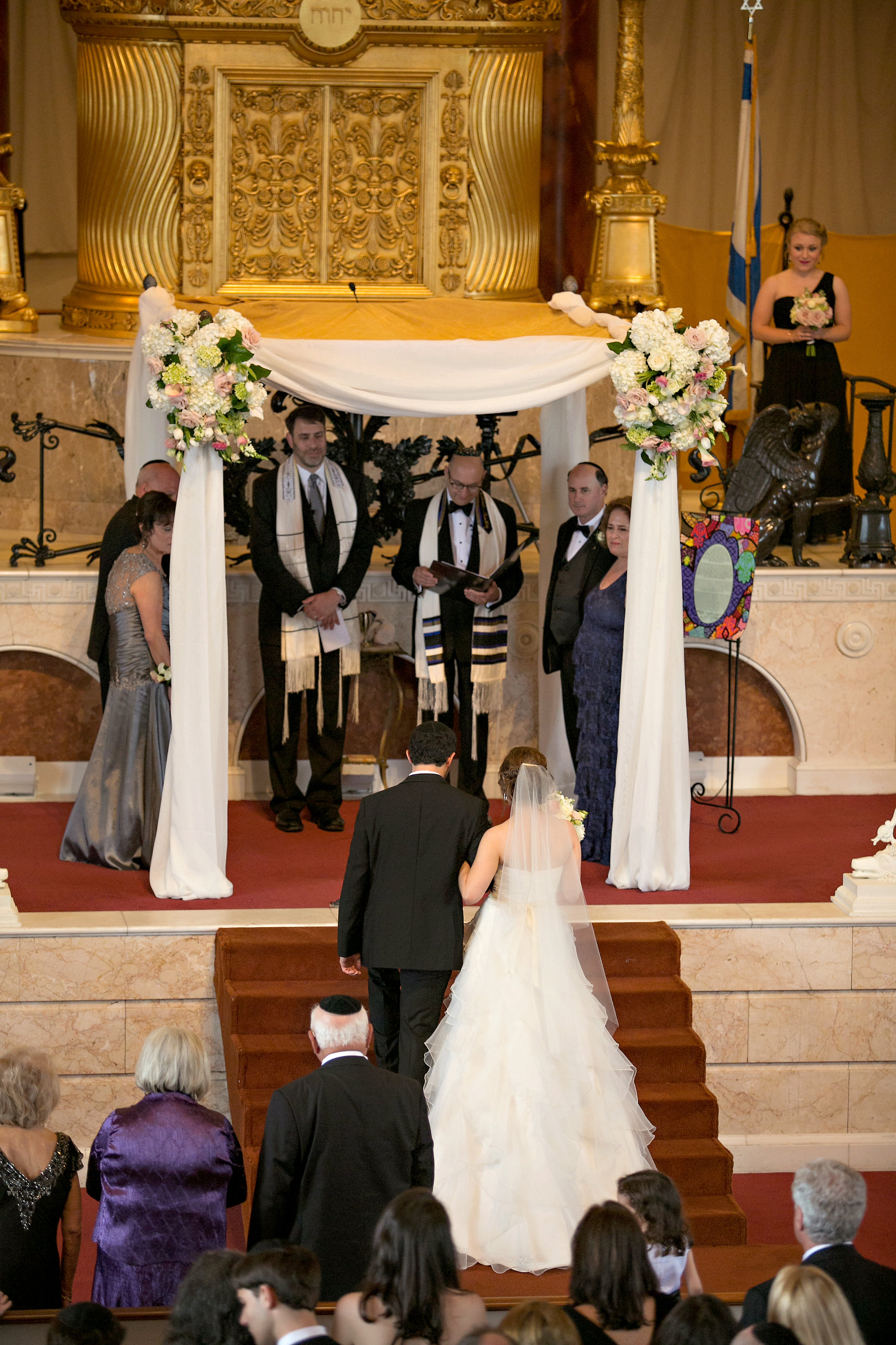 Bridal Entrance at Jewish wedding at The Temple in midtown Atlanta with traditional Jewish chuppah
