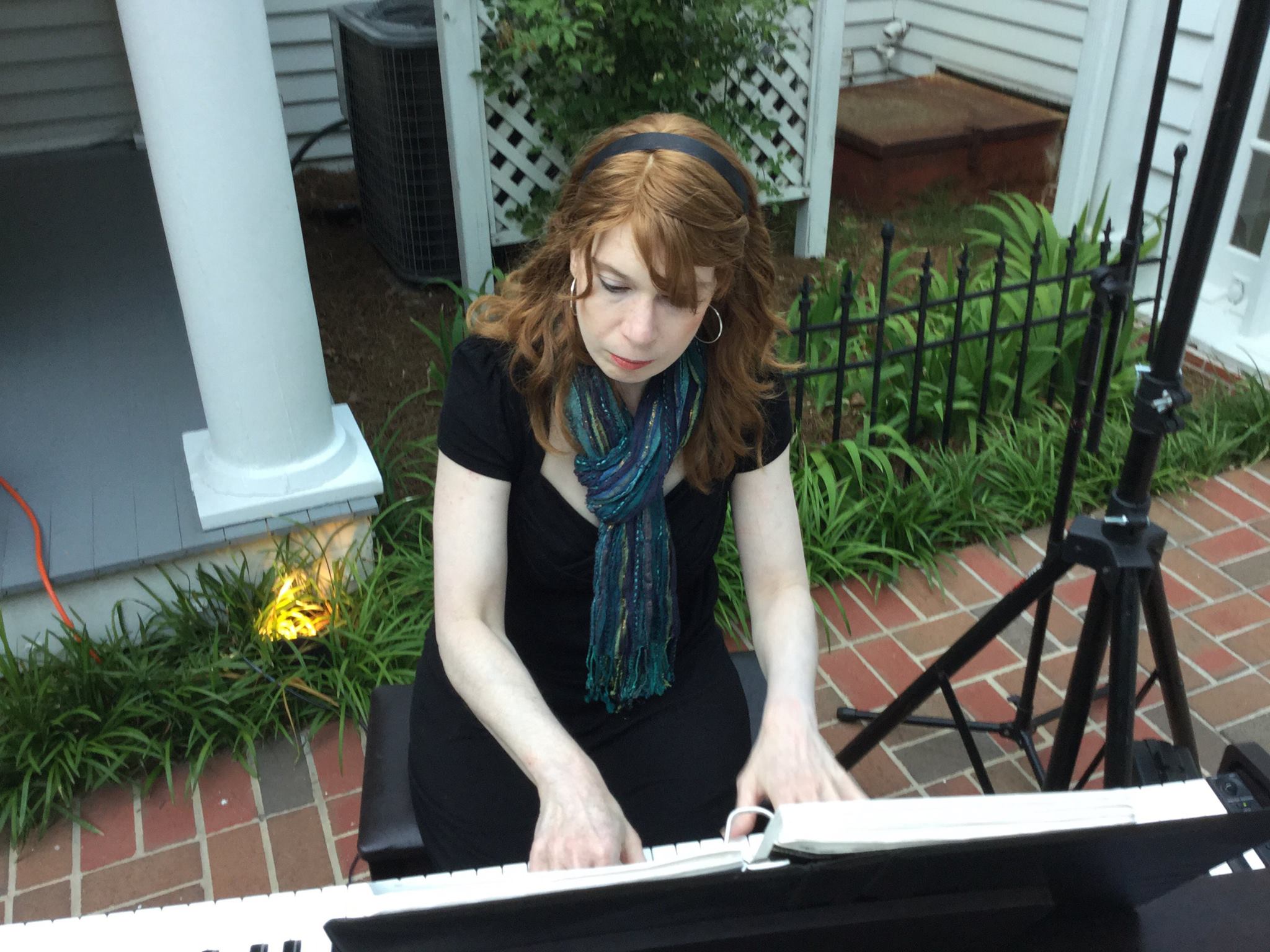 Jenny playing a portable digital piano at Flint Hill