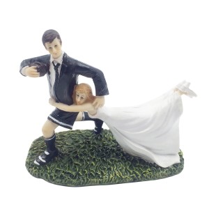 Rugby wedding cake topper with bride and groom