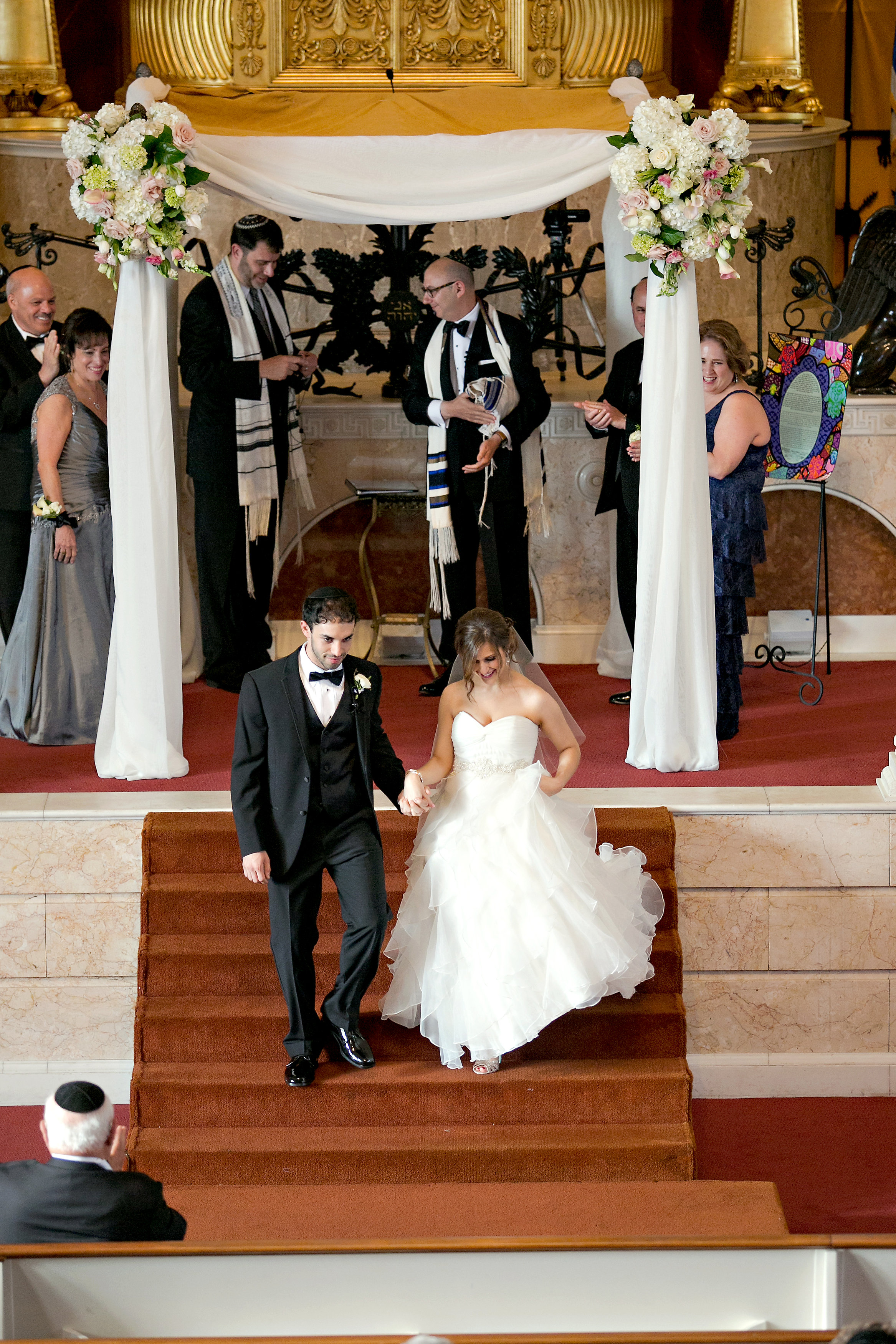 Bride and Groom exit at Jewish wedding at The Temple in midtown Atlanta