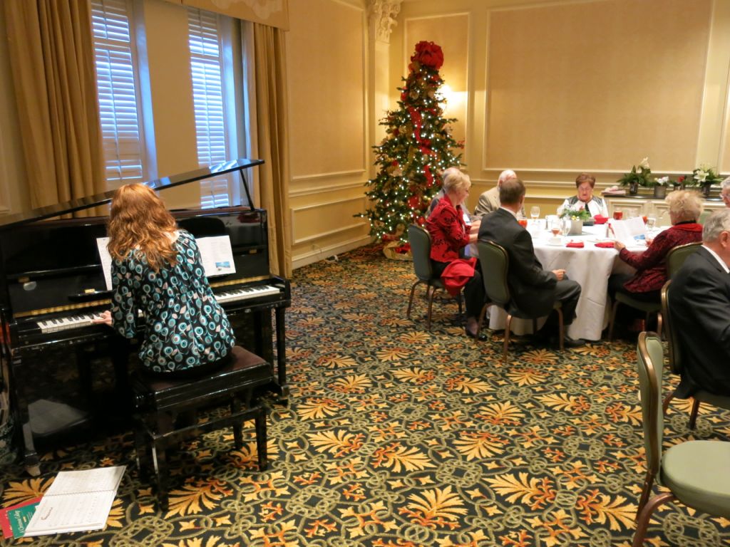 Jennifer Blaske, Atlanta Wedding Pianist, playing piano at Christmas Luncheon at Atlanta Athletic Club