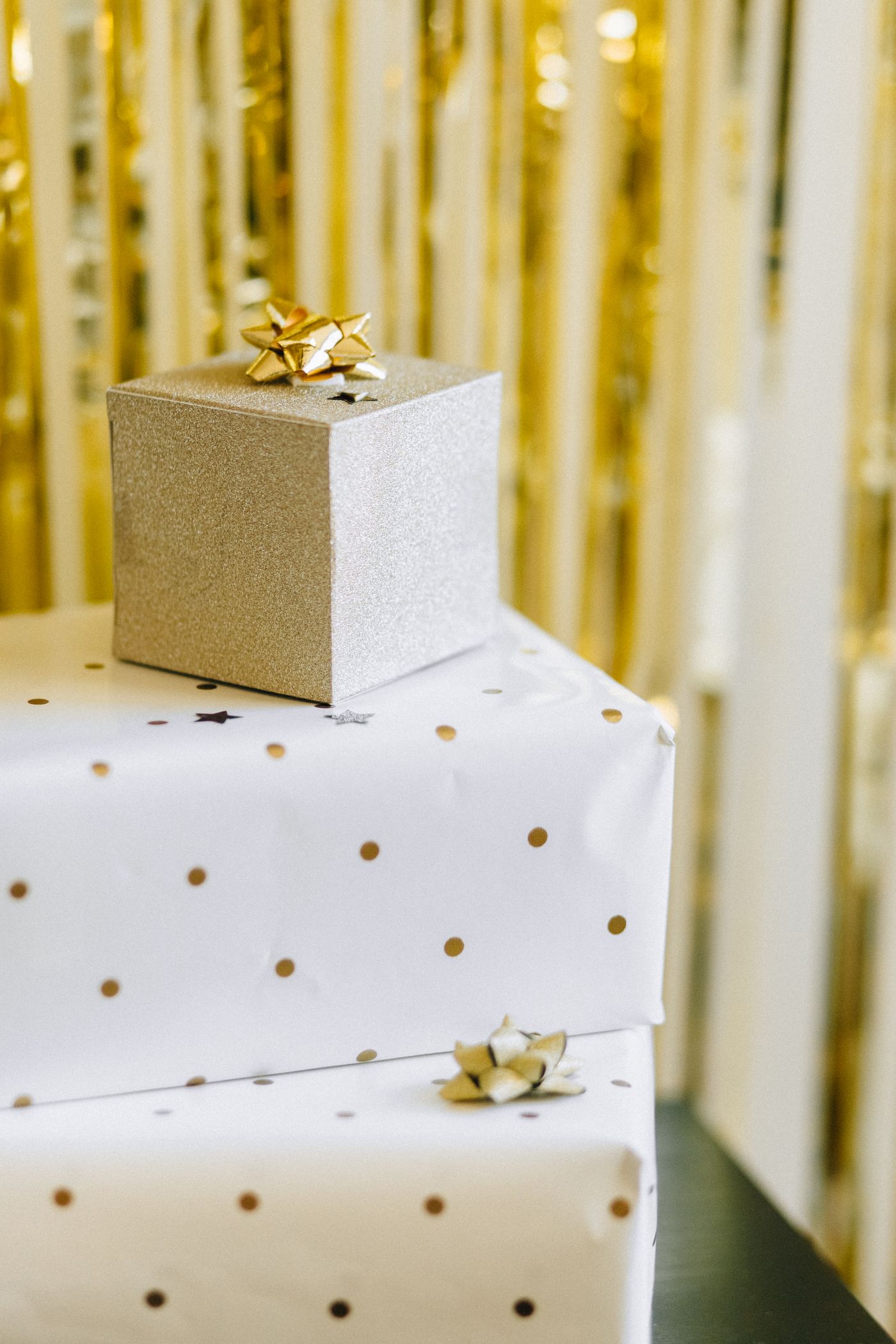 Small gift boxes decorated with golden ribbon