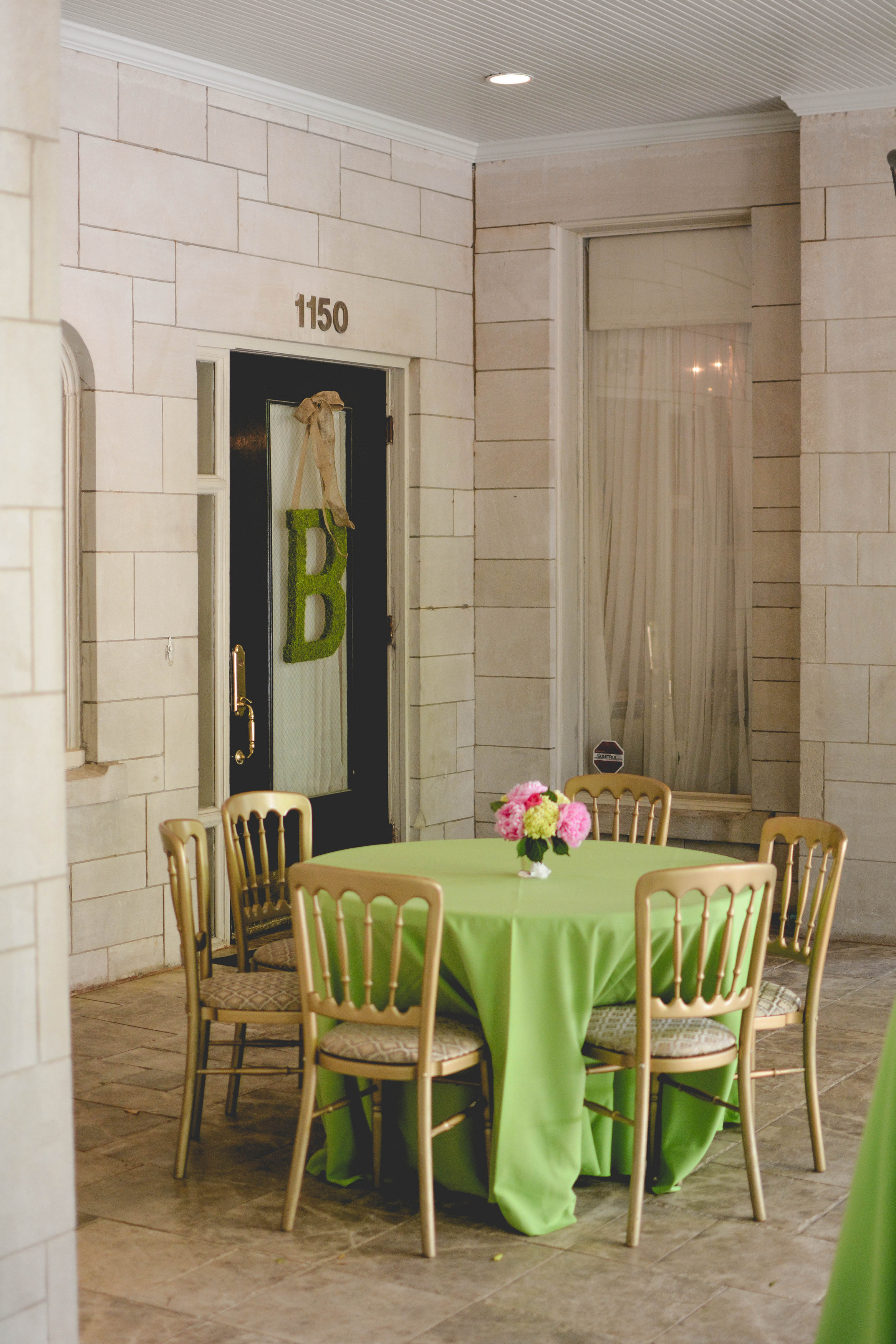 Wimbish House Wedding Atlanta floral centerpiece and light green tablecloths