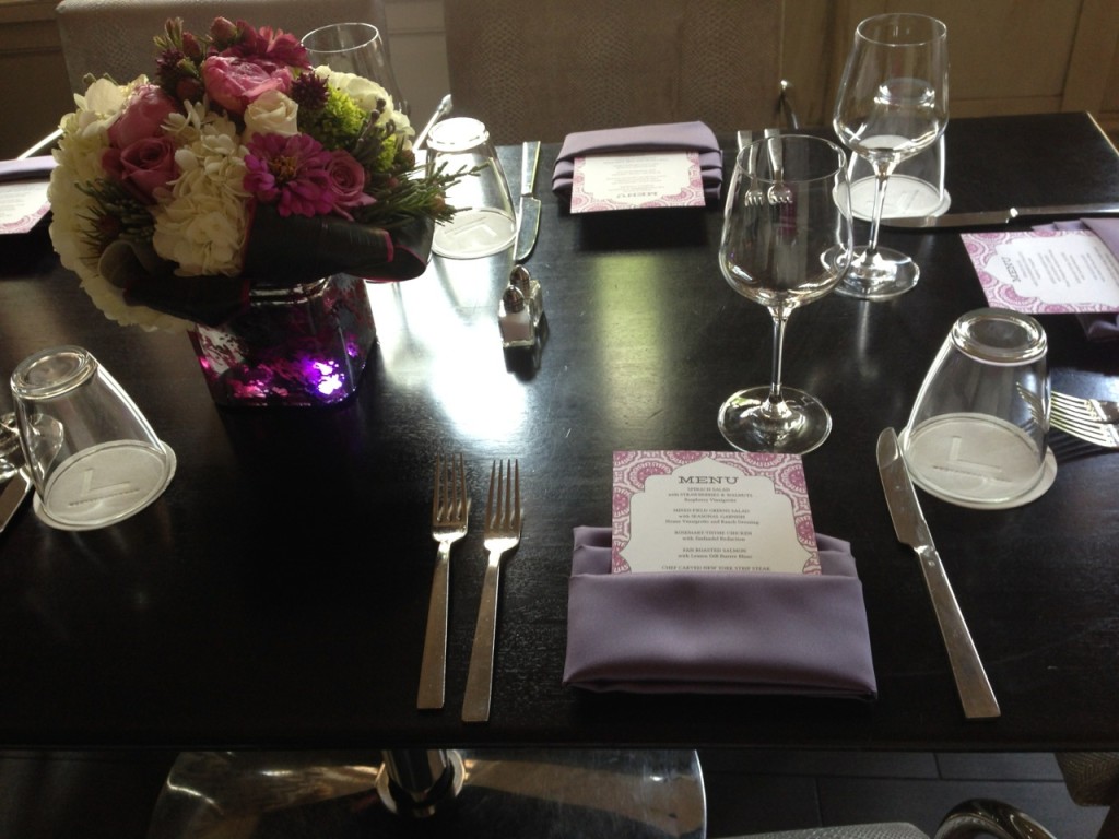 Purple place settings at wedding receptionat The Georgian Terrace Hotel