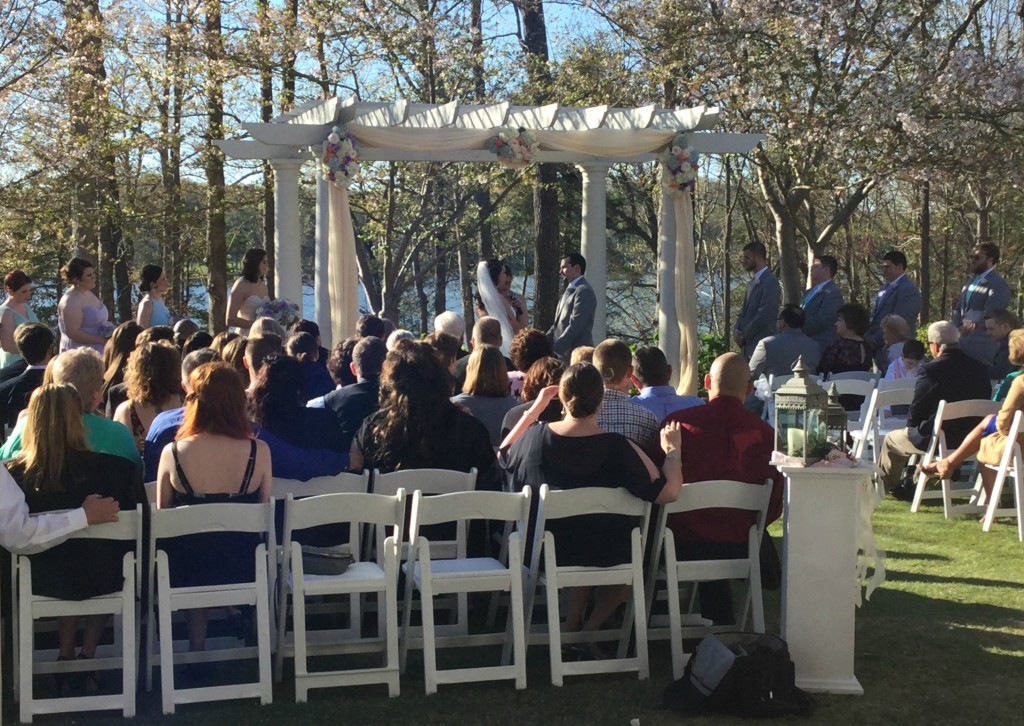 Bride and groom Outdoor wedding ceremony at Chattahoochee country club near Atlanta
