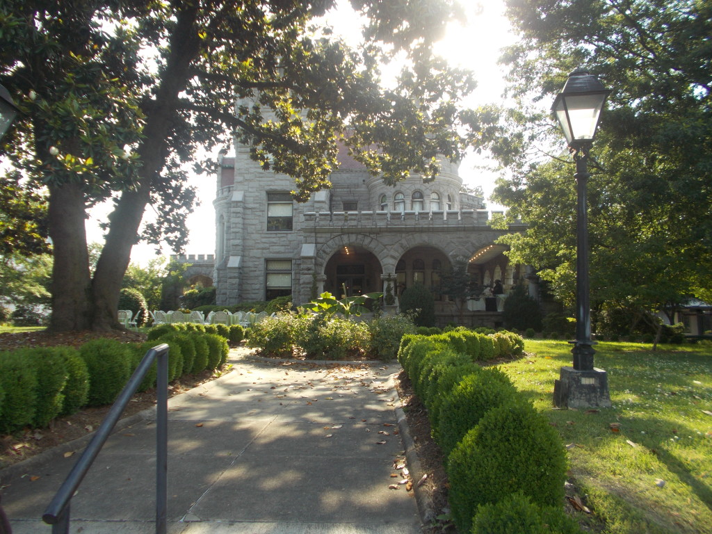 Rhodes Hall and its shaded front garden in Atlanta