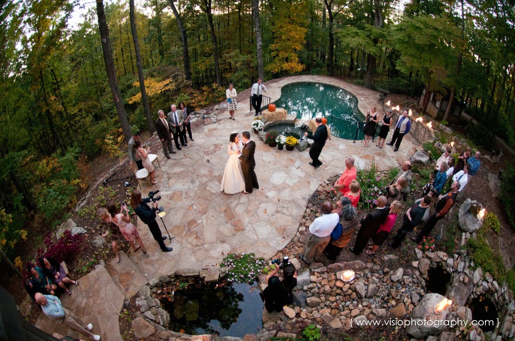 Bride and groom first dance outdoor wedding by pool in Alpharetta